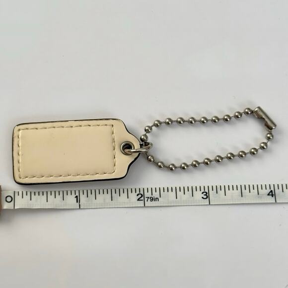 Coach ivory patent leather key fob bag charm hangtag silver-tone hardware 2” - Picture 4 of 5